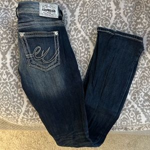 Express “barely bootcut” low rise jeans.
